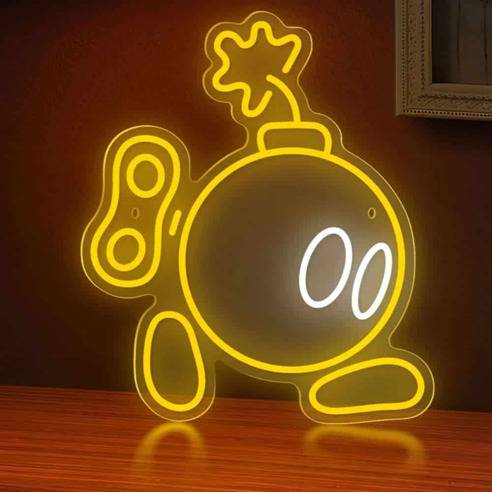 Neon sign of a cartoon bomb with fuse, glowing yellow and white, on a dark background.