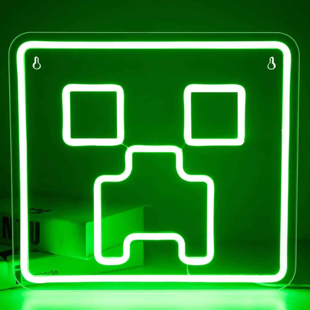 Neon sign featuring a creepy face design in bright green, ideal for modern decor or themed events.