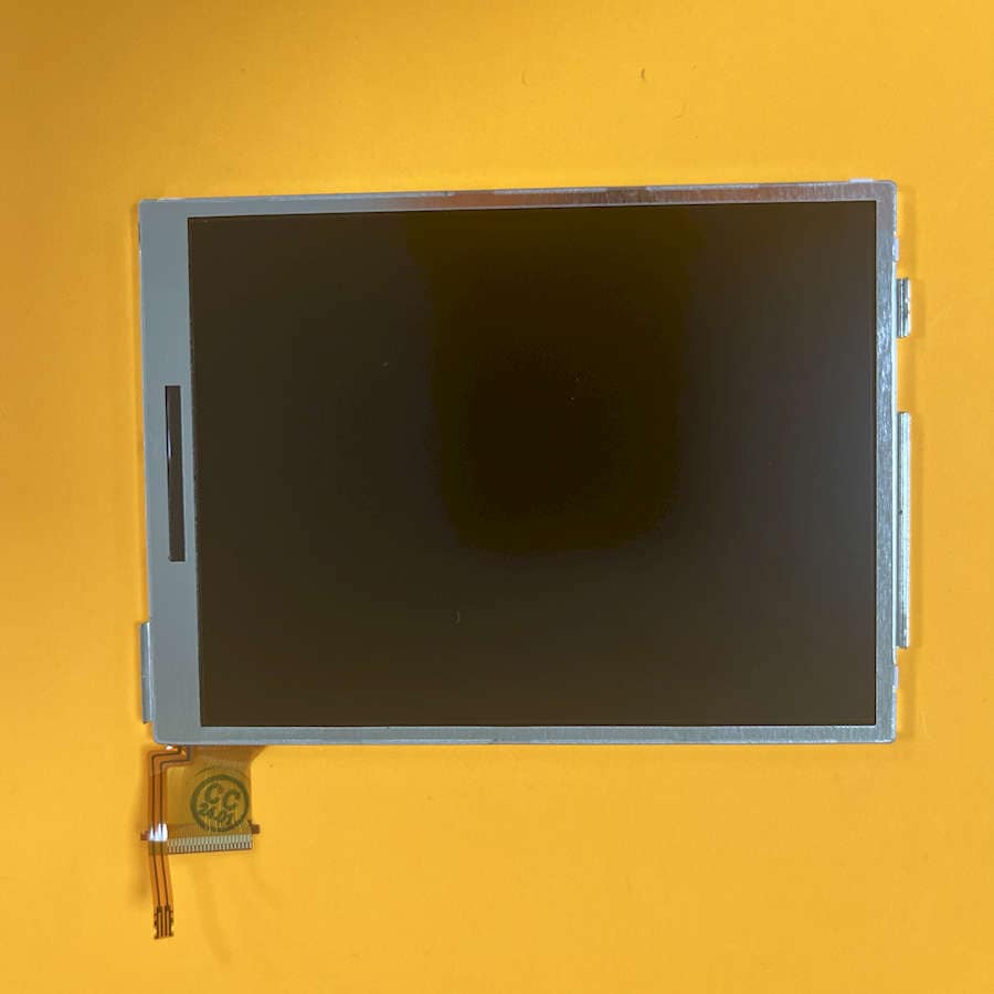 Replacement LCD screen for Nintendo 3DS XL with flex cable attached.