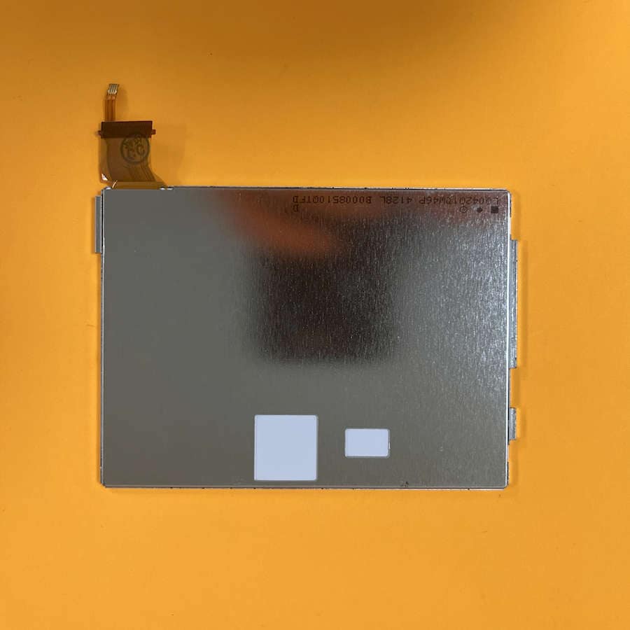 Replacement LCD screen for Nintendo 3DS XL with flex cable attached.