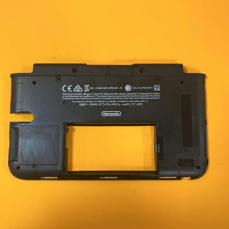 White back frame for Nintendo 3DS XL gaming console.