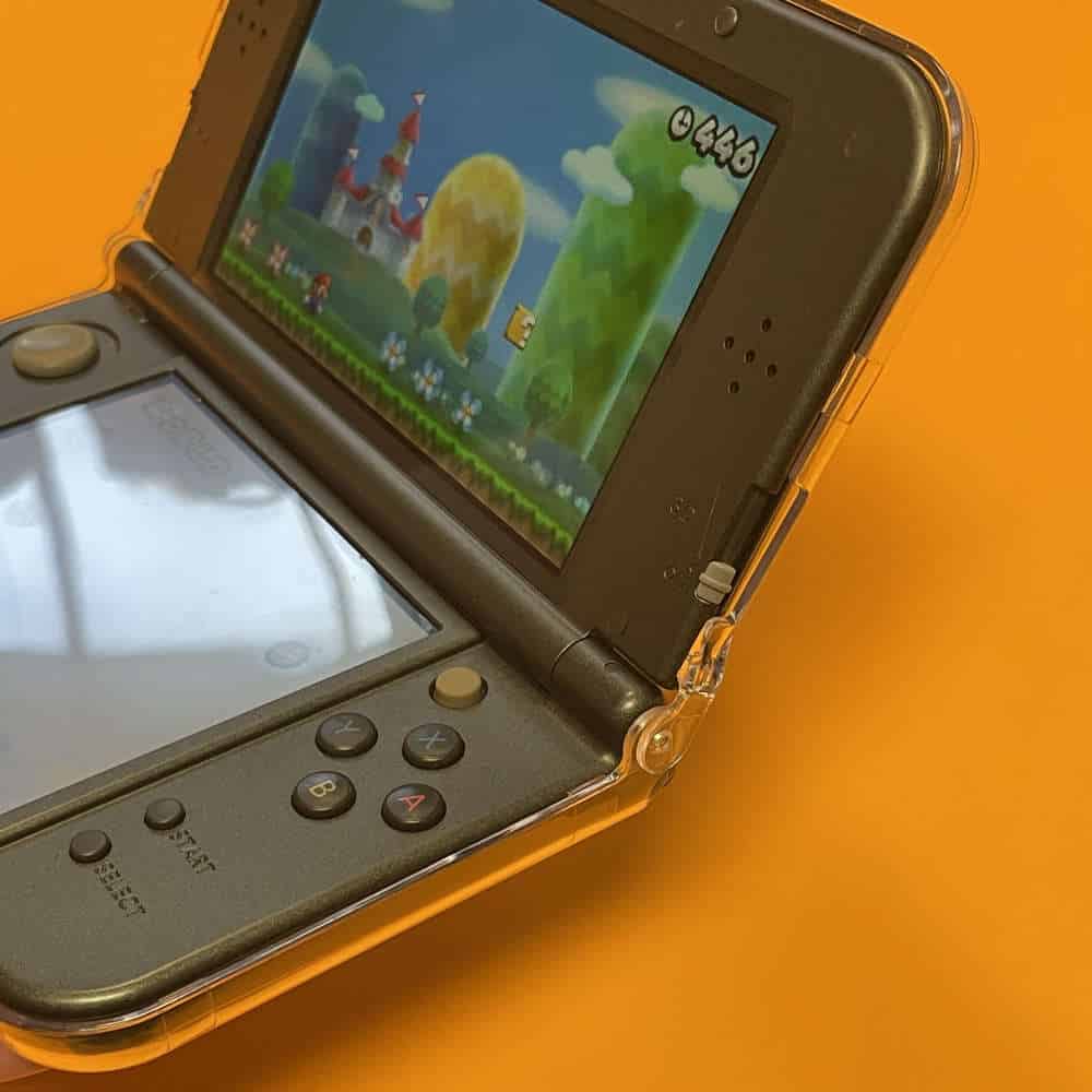 Protective case and accessories for New 3DS XL gaming console.
