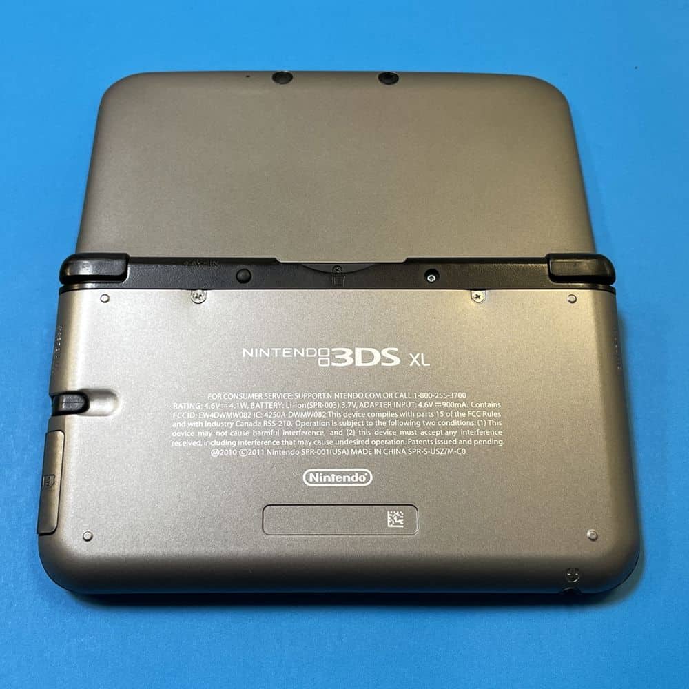 Nintendo 3DS XL gaming console with preloaded games, ready to play, perfect for portable gaming.