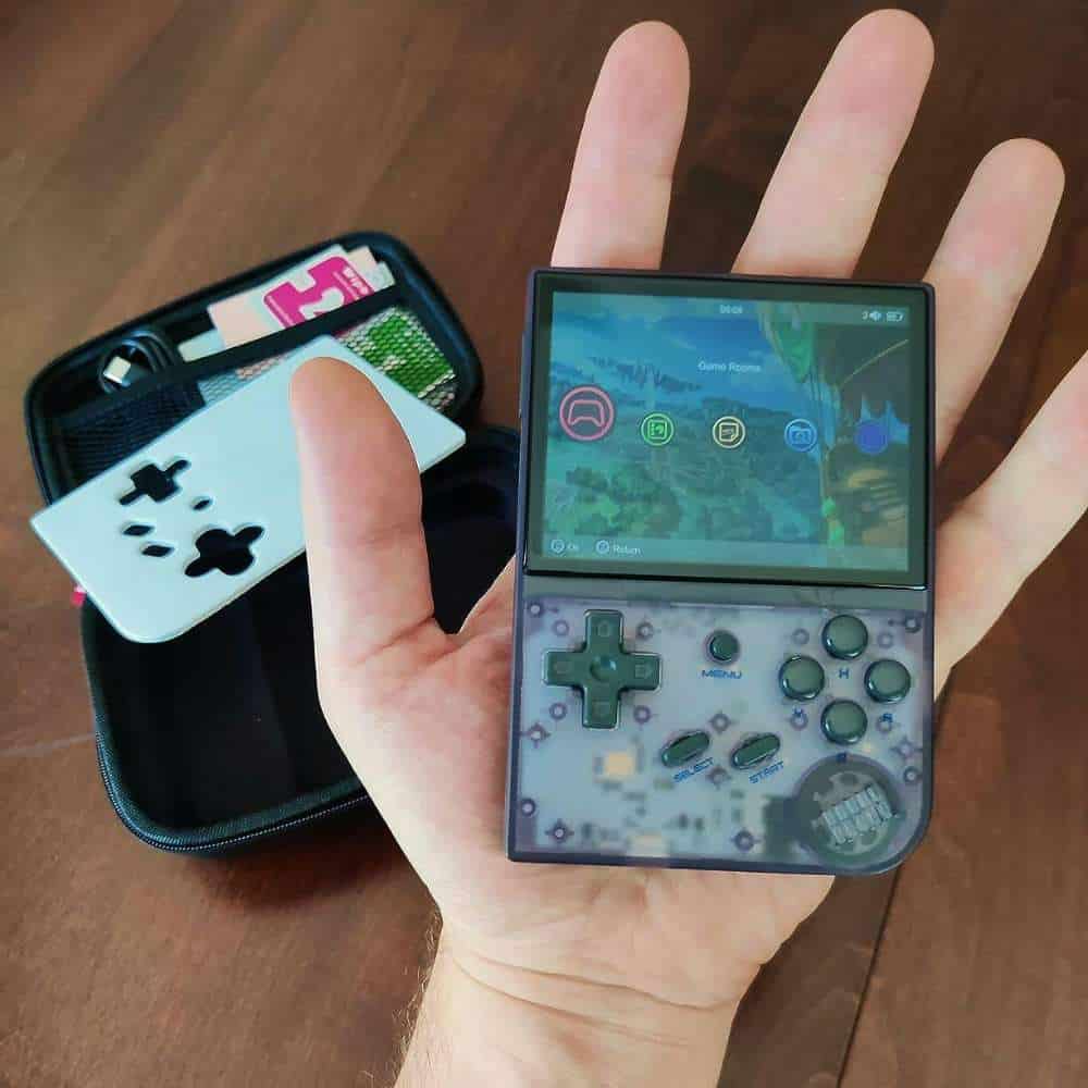 Handheld retro gaming console with colorful screen and controls.