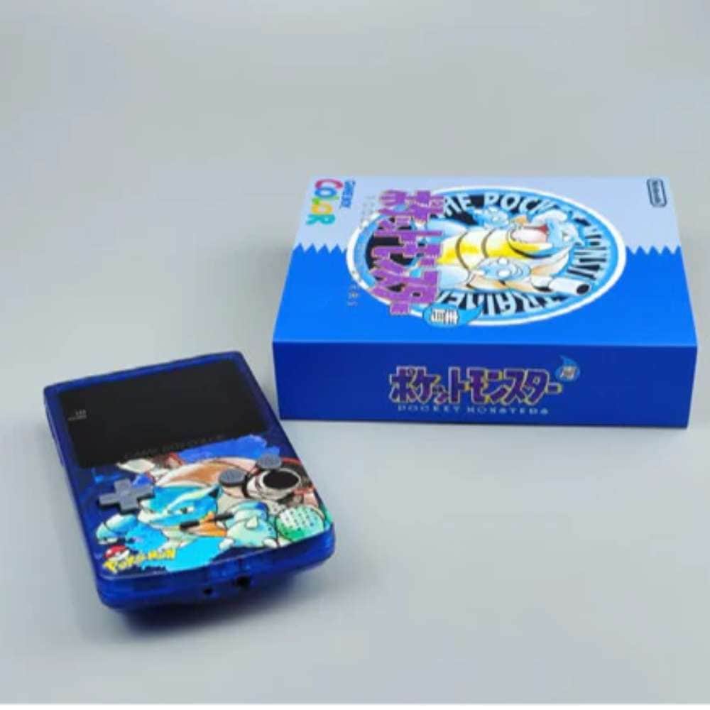 Vintage Blastoise-themed Game Boy Color with illuminated logo.