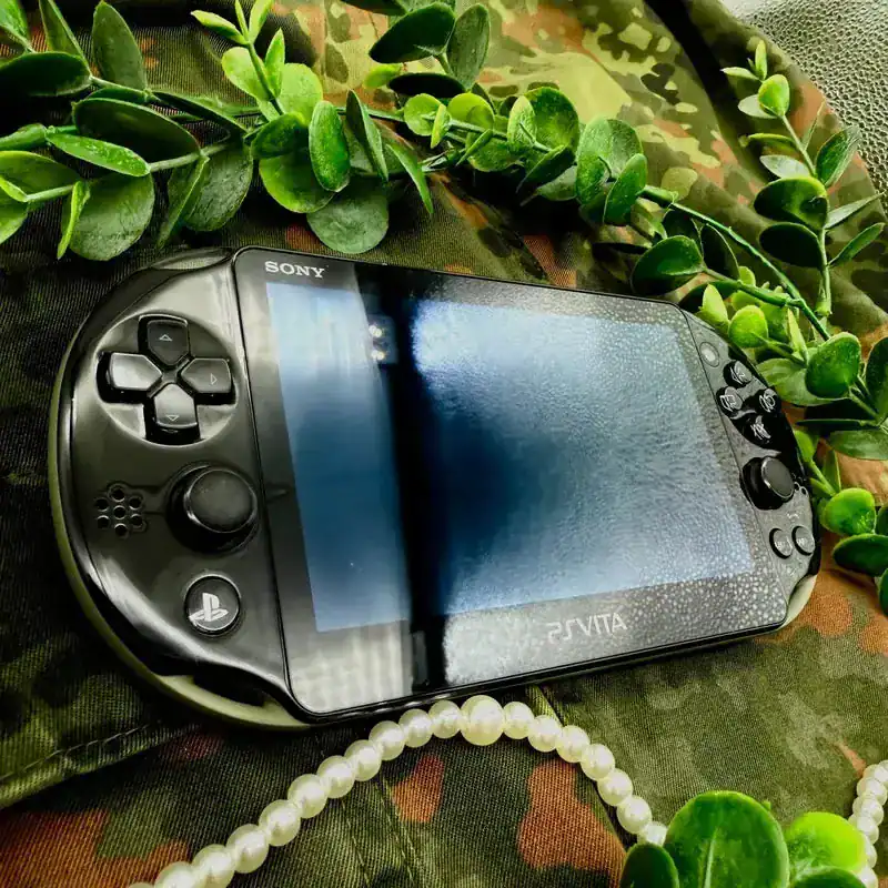 Alternative view of Khaki/Black PlayStation Vita 2000 – Slim Model | Modded, Cleaned & Ready to Play