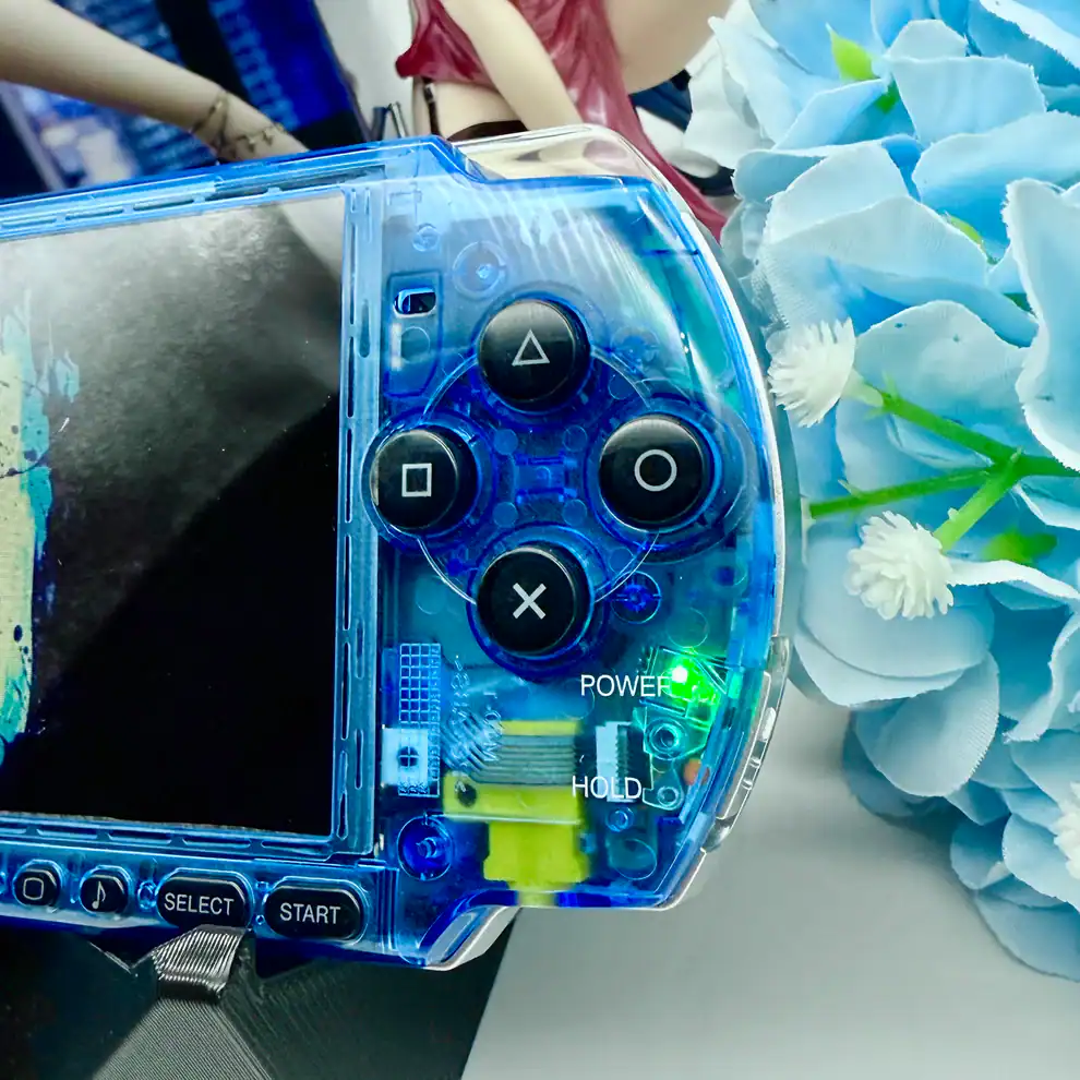 PSP-3000-Transparent-Blue-–-Cleaned-amp-Tested-UMD-Digital-Games-Collector-Favorite-3.webp