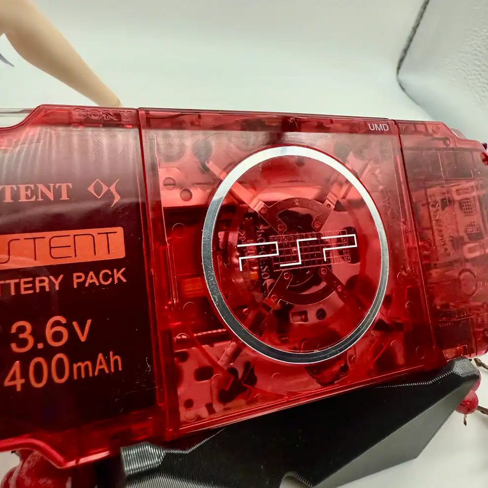 PSP-3000-Transparent-Red-–-Cleaned-Tested-UMD-Digital-Collectible-Edition-2.webp