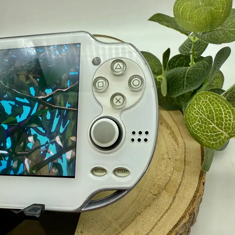 White-PlayStation-Vita-1000-–-OLED-Display-Modded-Cleaned-Ready-to-Play-3.webp