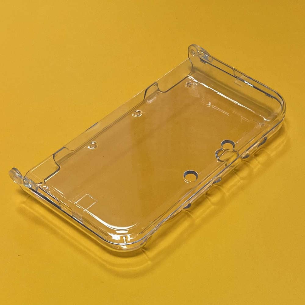 Protective case for 'New' 3DS XL gaming console. Clear plastic design offers protection and visibili.