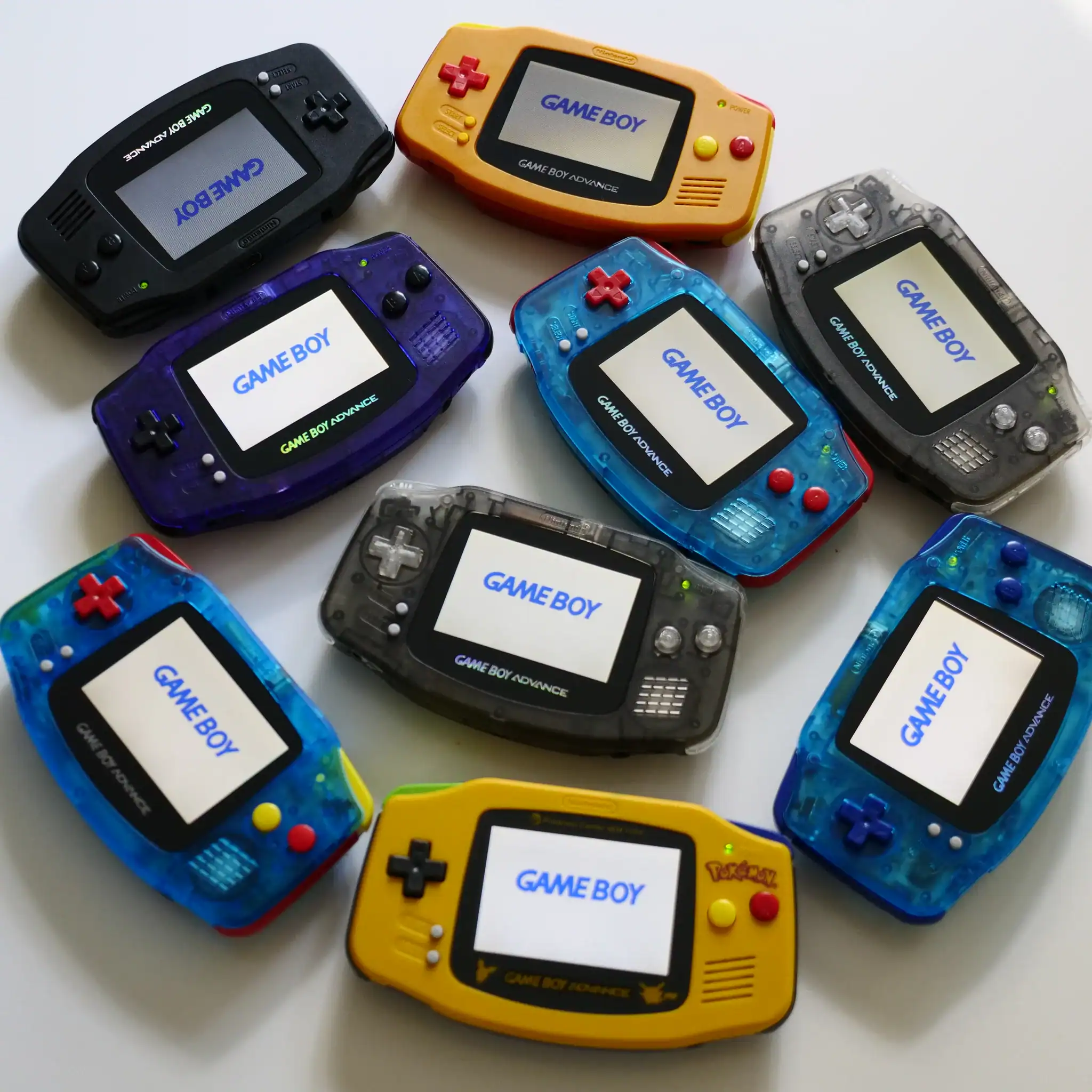 Custom Game Boy Advance handheld console with vibrant shell options.