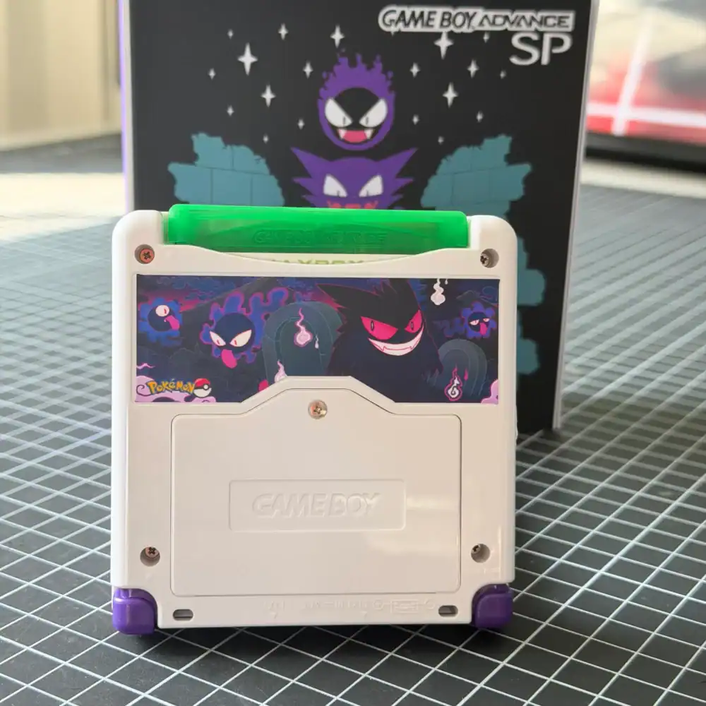 GBA SP with Gengar, Haunter, Gastly Pokémon decals and IPS backlit mod. Perfect for collectors and g.