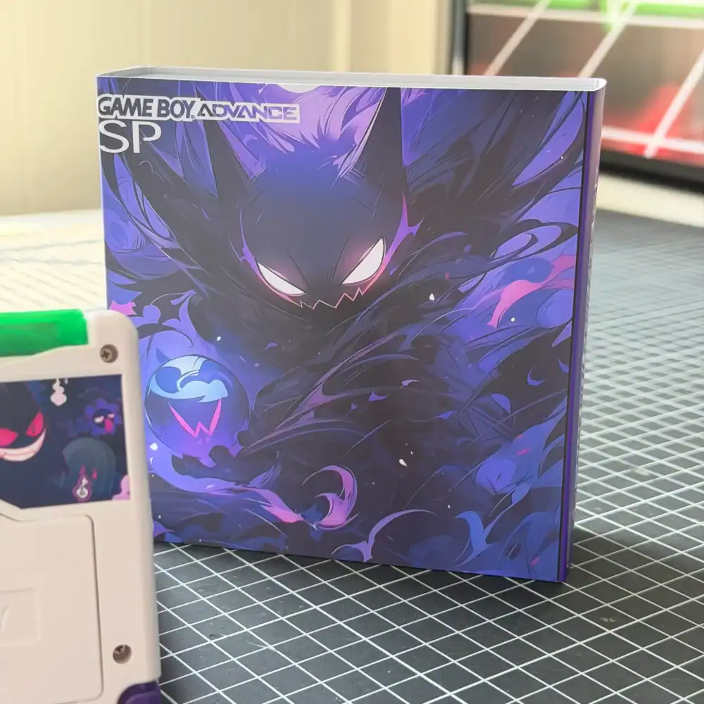 Gengar-themed Game Boy Advance SP with IPS backlit mod and original box.