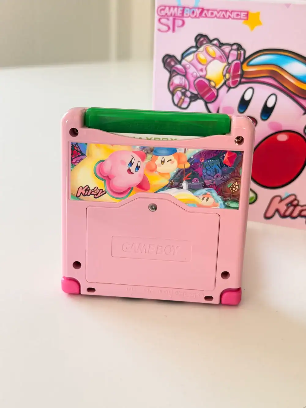 Kirby-themed Nintendo Game Boy Advance SP with IPS backlit mod and original box. Perfect for collect.