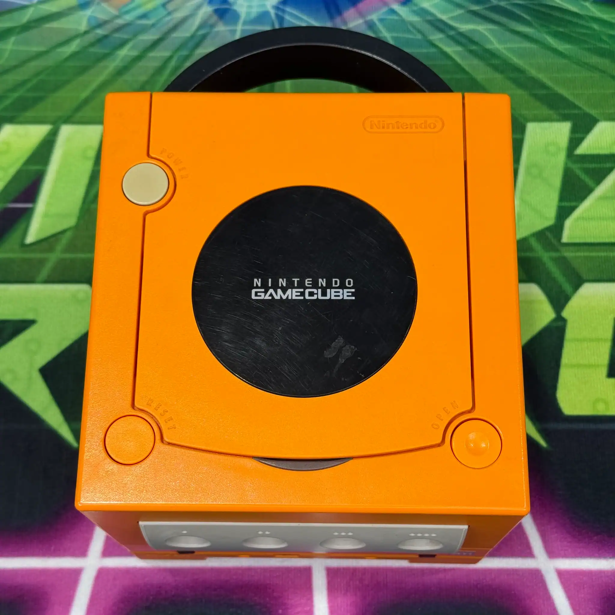 Custom Spice Orange GameCube console with unique design.