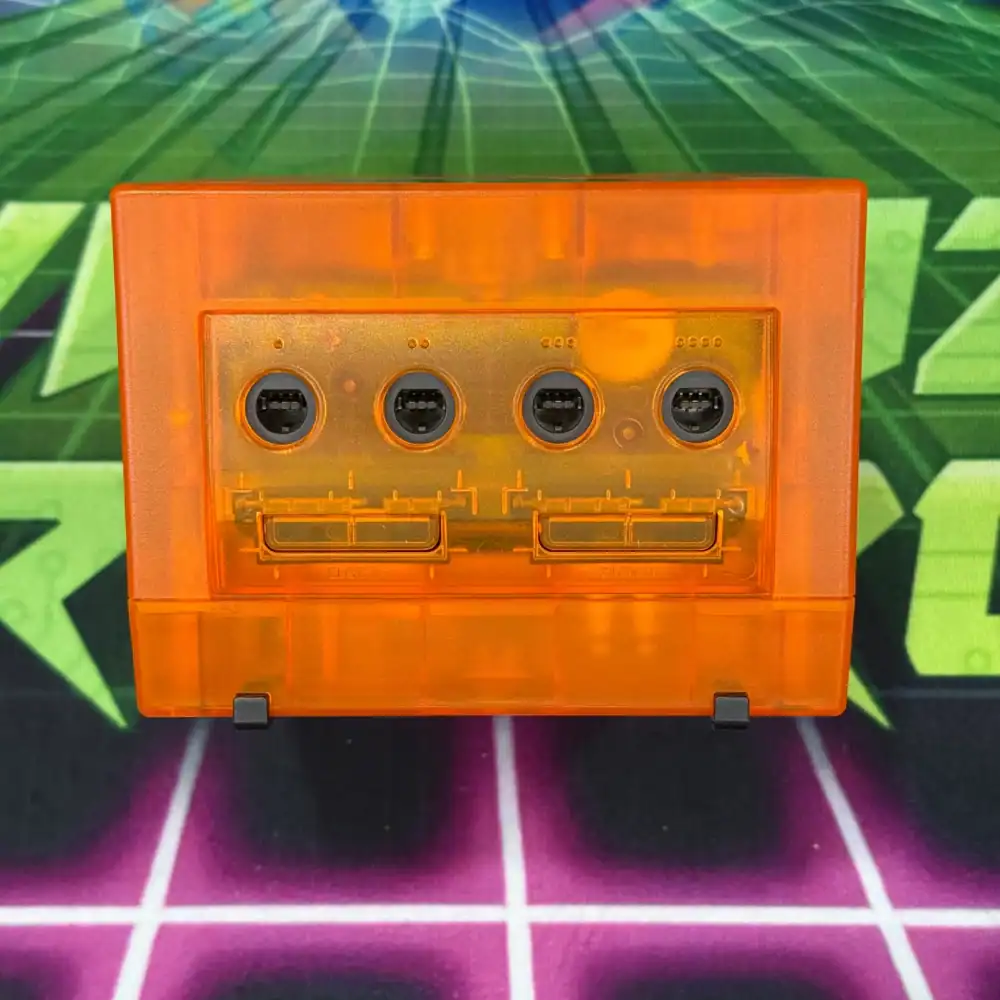 Custom transparent orange GameCube with visible internal components.
