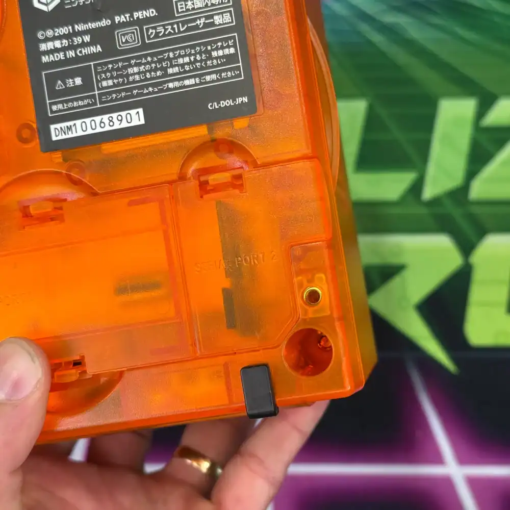 Custom transparent orange GameCube console for gaming enthusiasts.
