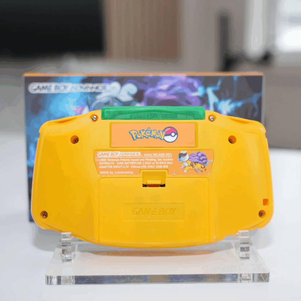 High-quality Pokémon Raiku-themed GBA IPS screen mod on yellow Game Boy Advance with box.