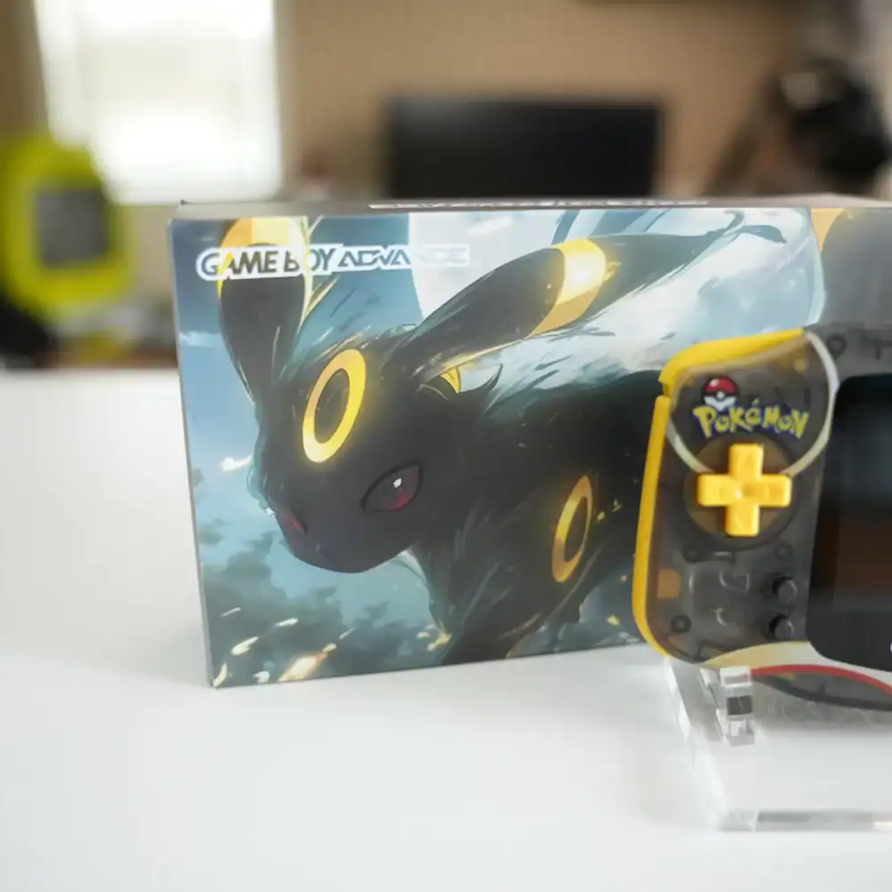 Umbreon-themed Nintendo Game Boy Advance GBA console with IPS backlit mod and Pokémon design.