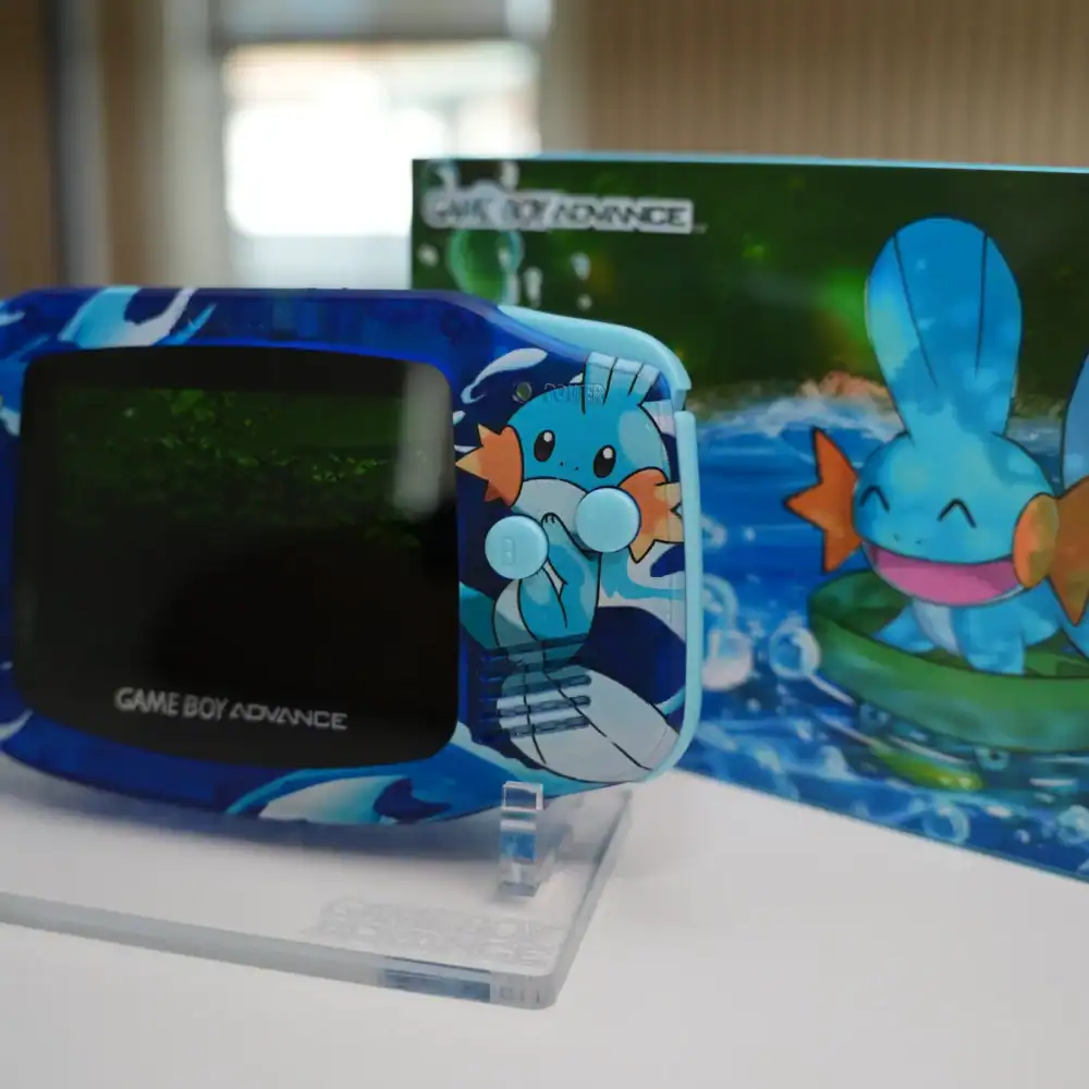 Custom backlit IPS modded Mudkip GBA console with box, perfect for collectors and gamers.
