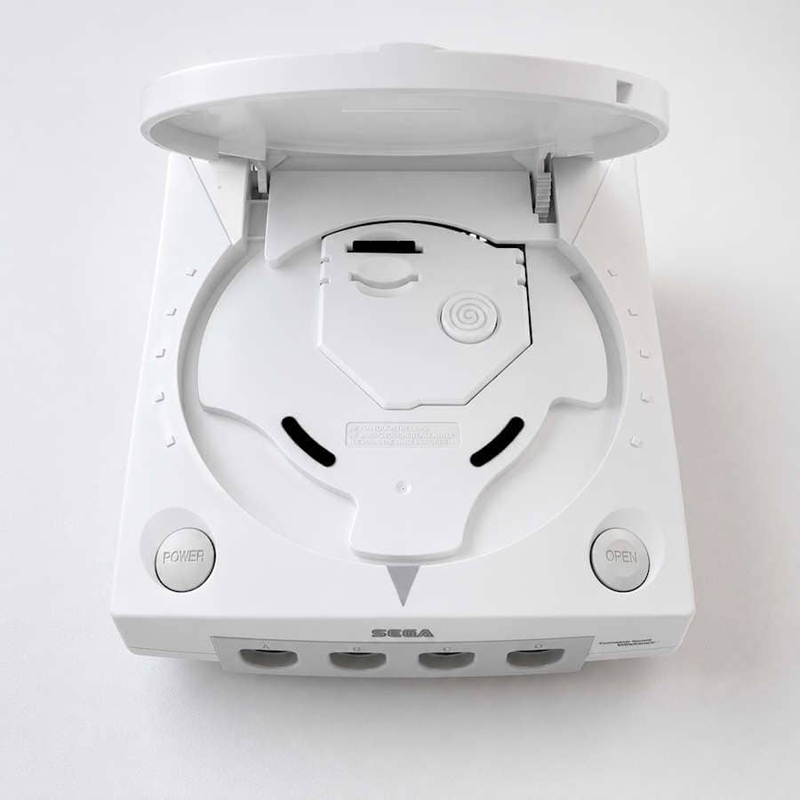 Modded SEGA Dreamcast console with open lid and visible disc tray.