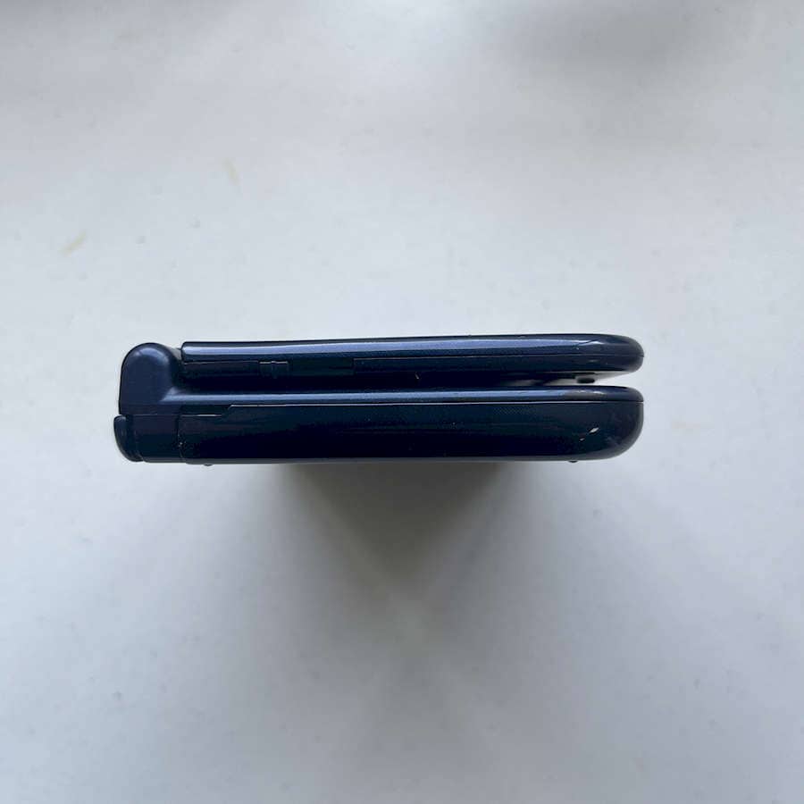 Refurbished blue Nintendo 3DS XL with 128GB preloaded for gaming.