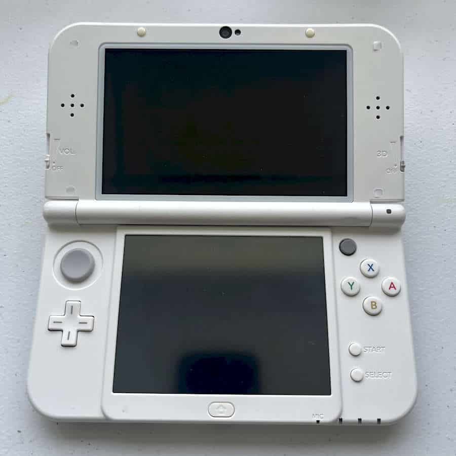 Refurbished white Nintendo 3DS XL with 128GB preloaded storage.