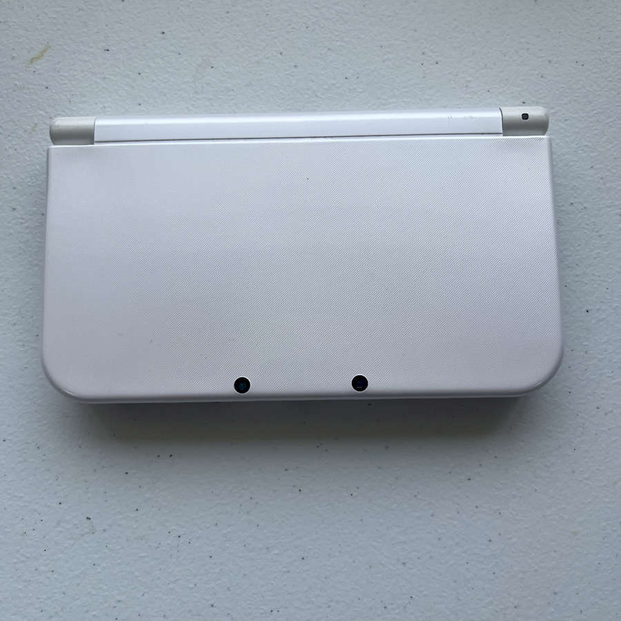 White Nintendo 3DS XL with 128GB preloaded and ready to play.