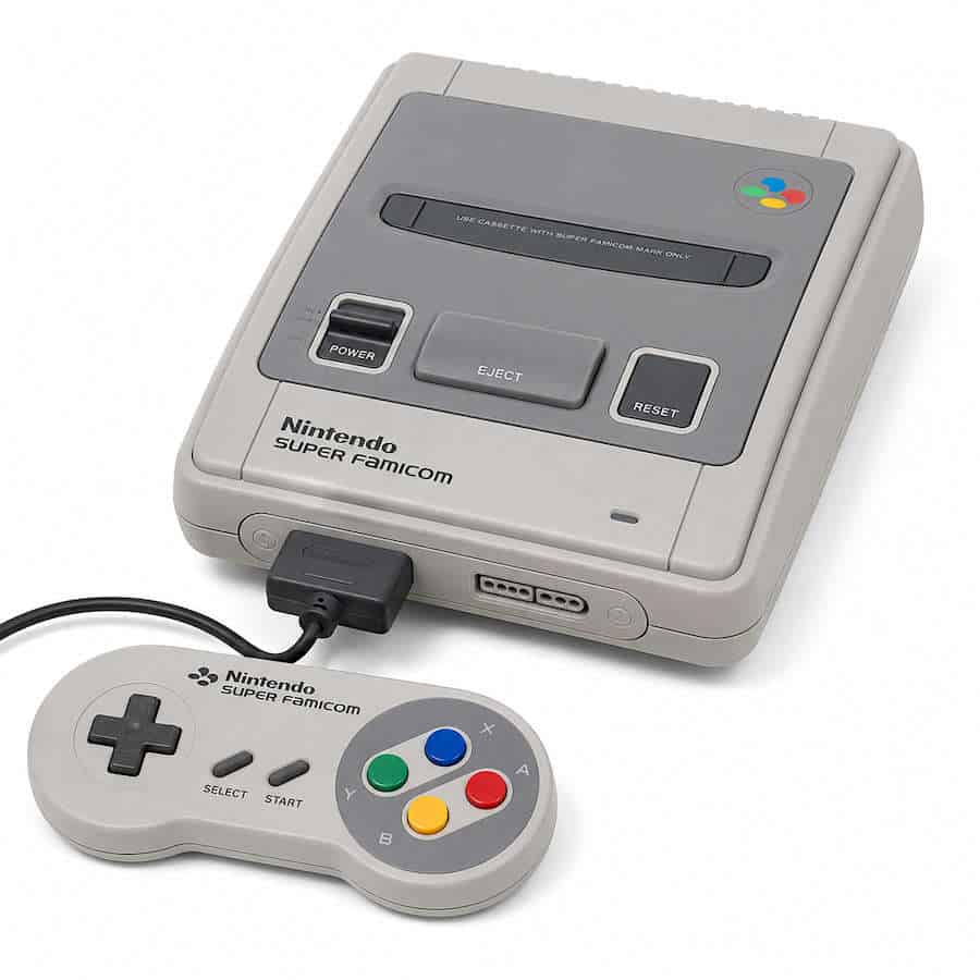 Super Famicom console with EverDrive cartridge and controller for retro gaming.