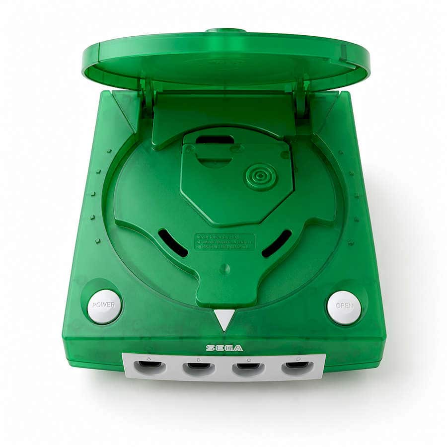 Green Sega Dreamcast console with open disc tray and cover.