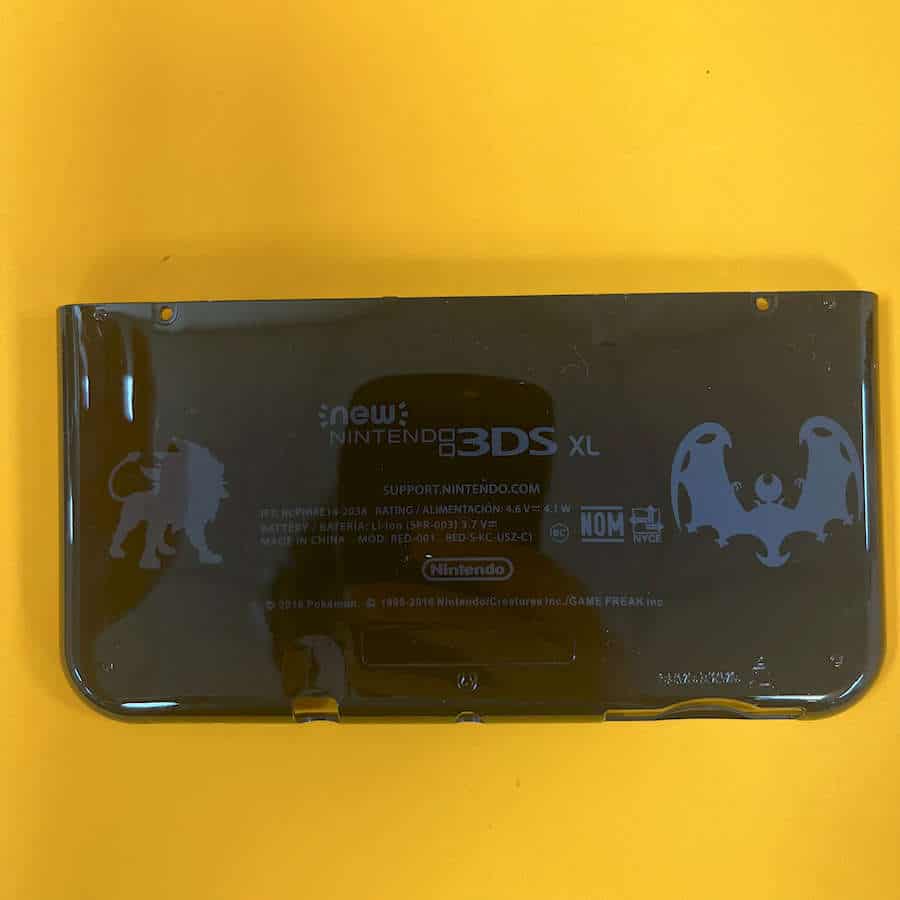 Pokemon Sun & Moon style shell cover for Nintendo 3DS XL on yellow background.