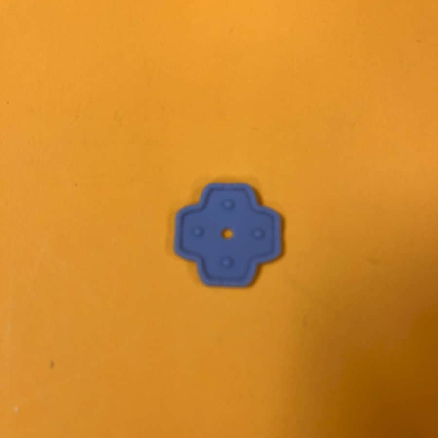 Blue rubber pad for Nintendo 3DS XL D-Pad button replacement.