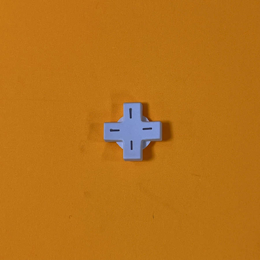 White D-Pad button for Nintendo 3DS XL gaming console.