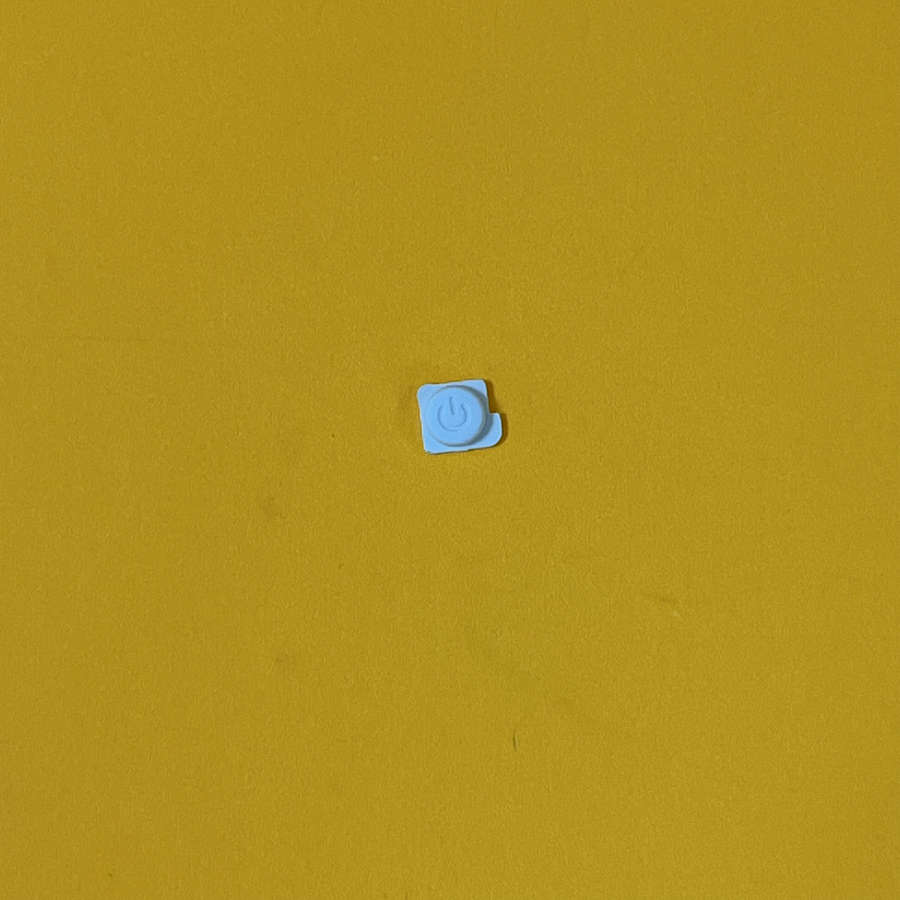Blue power button for Nintendo 3DS XL on yellow background.