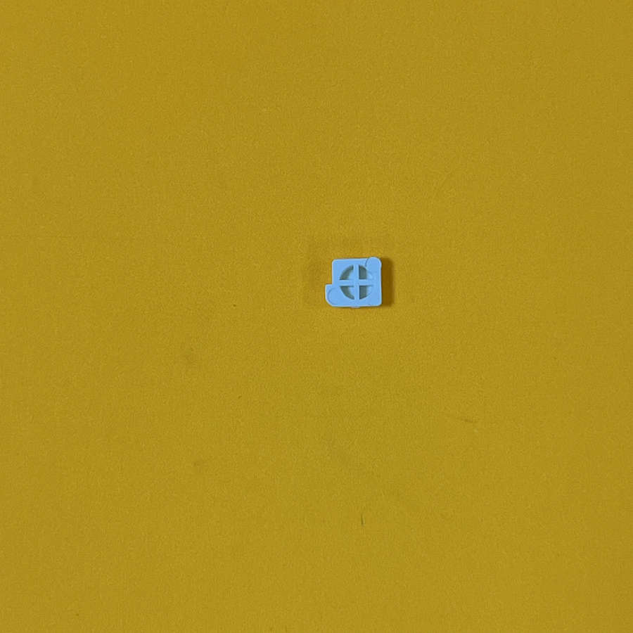 Blue power button for Nintendo 3DS XL on yellow background.