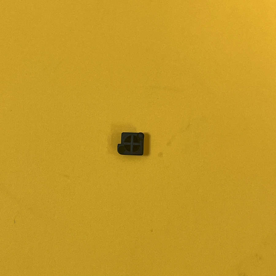 Black Y Button for Nintendo 3DS XL on yellow background.
