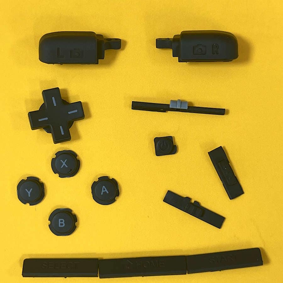 Black button set for Nintendo 3DS XL with directional pad and shoulder buttons.