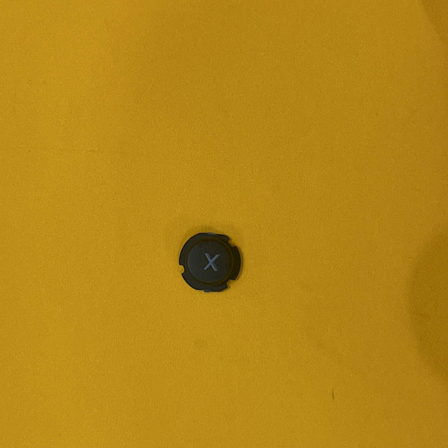 Black X button for Nintendo 3DS XL on yellow background.