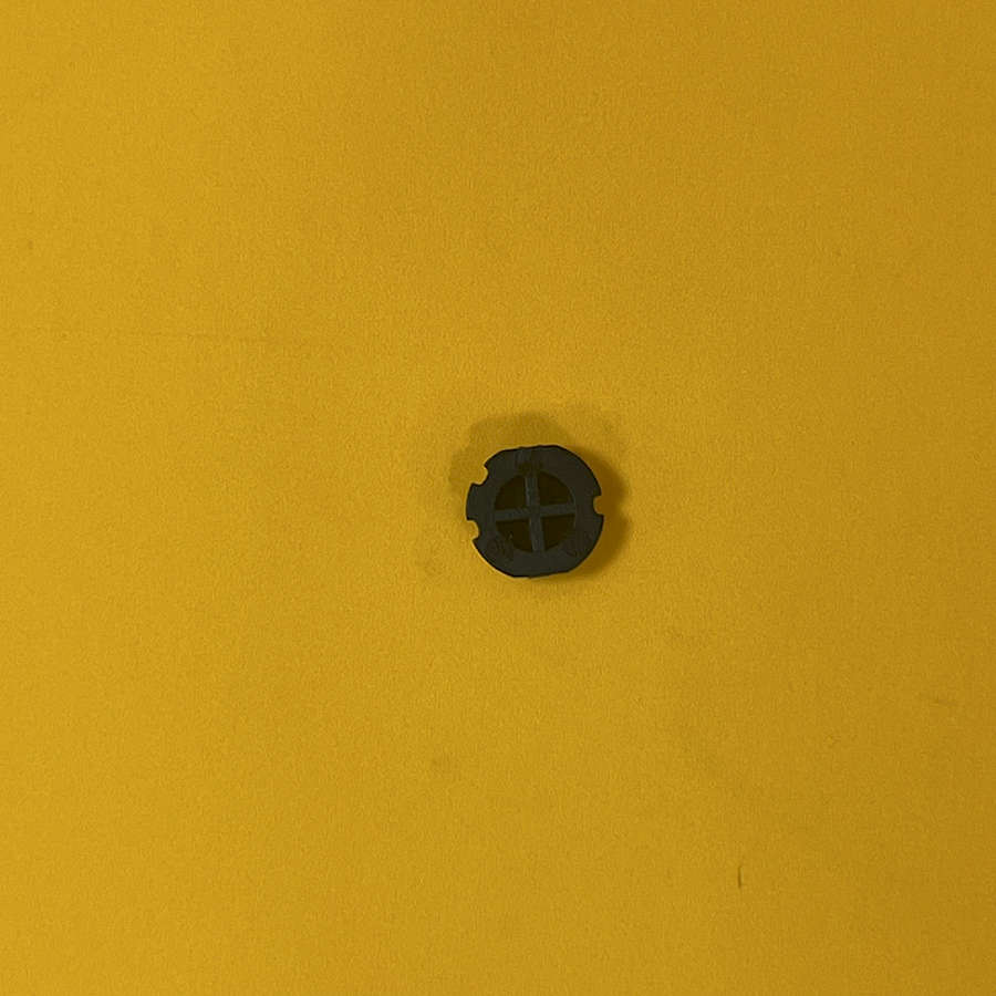 Black B button for Nintendo 3DS XL replacement part on yellow background.