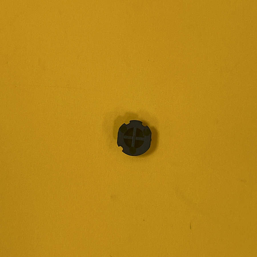 Black button for Nintendo 3DS XL on yellow background.