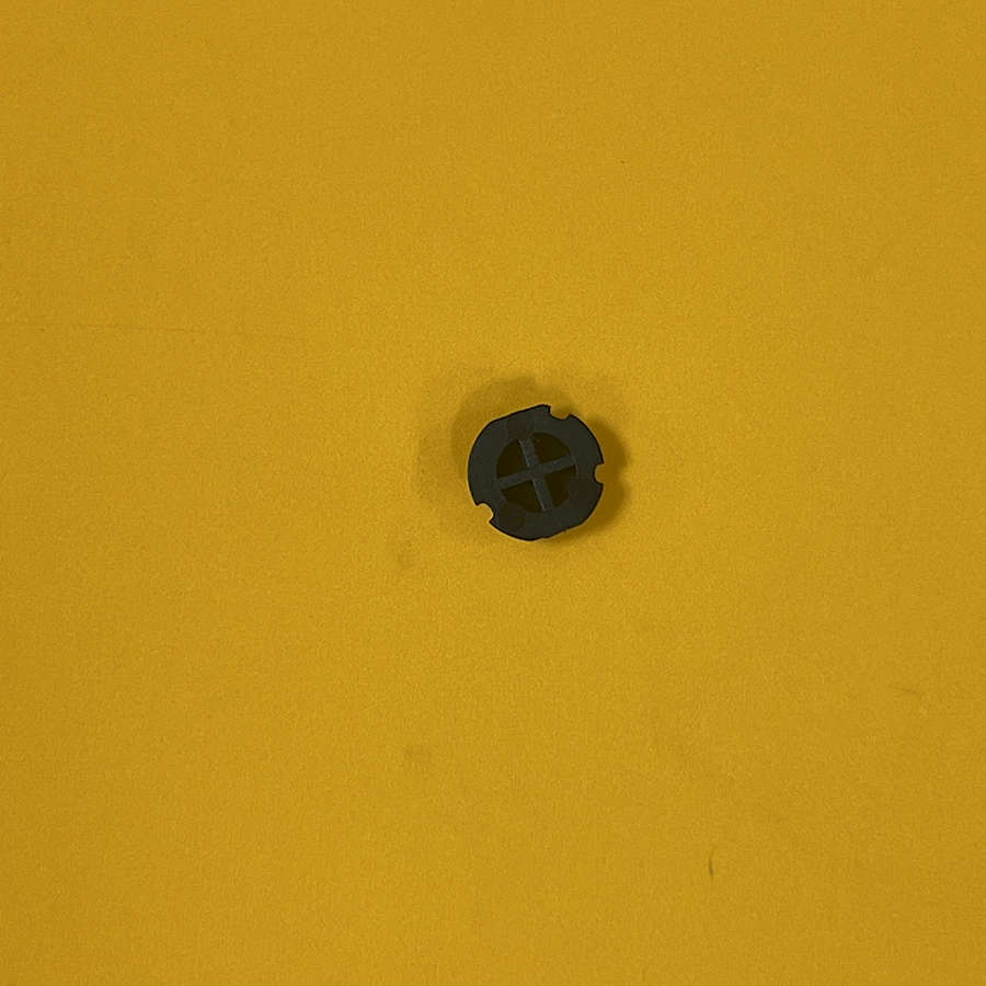 Black Y Button for Nintendo 3DS XL on yellow background.