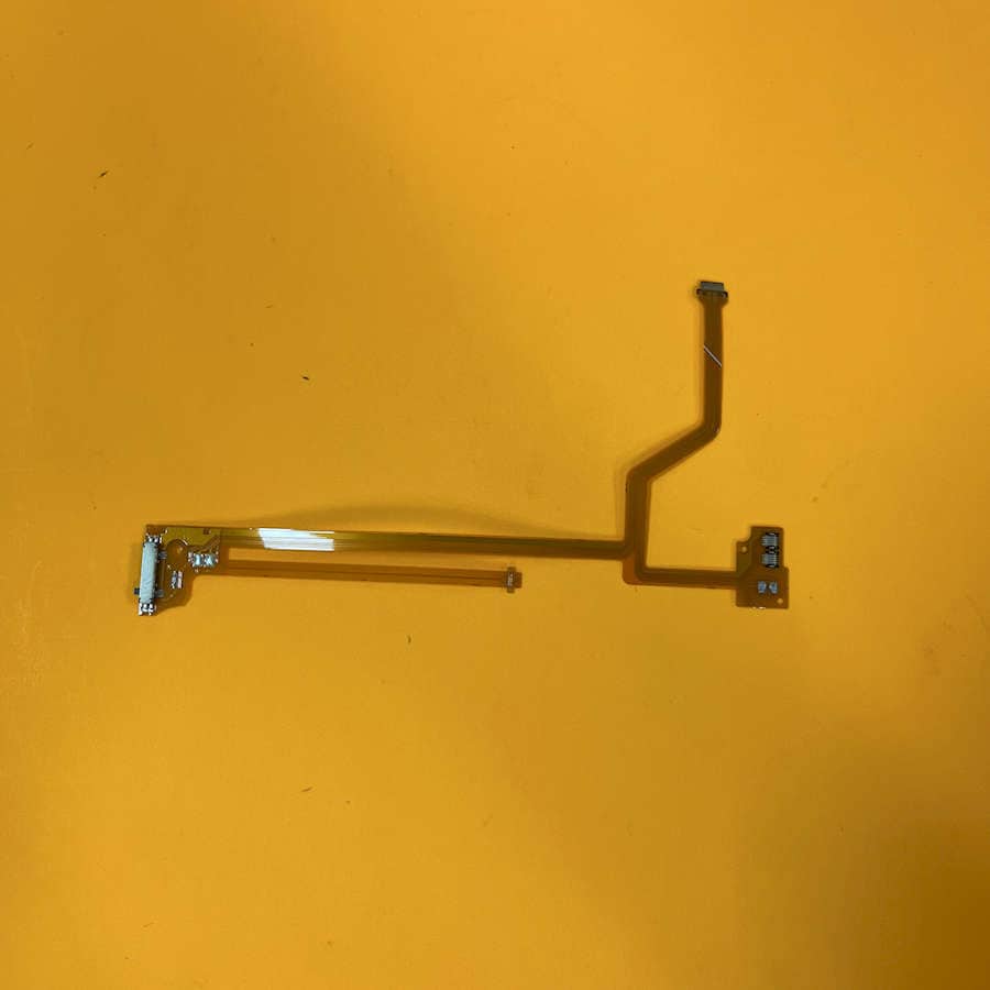 Replacement speaker cable for Nintendo 3DS console on yellow background.